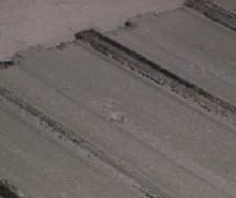 91视频IOS下载砌块生产线的刮浆装置